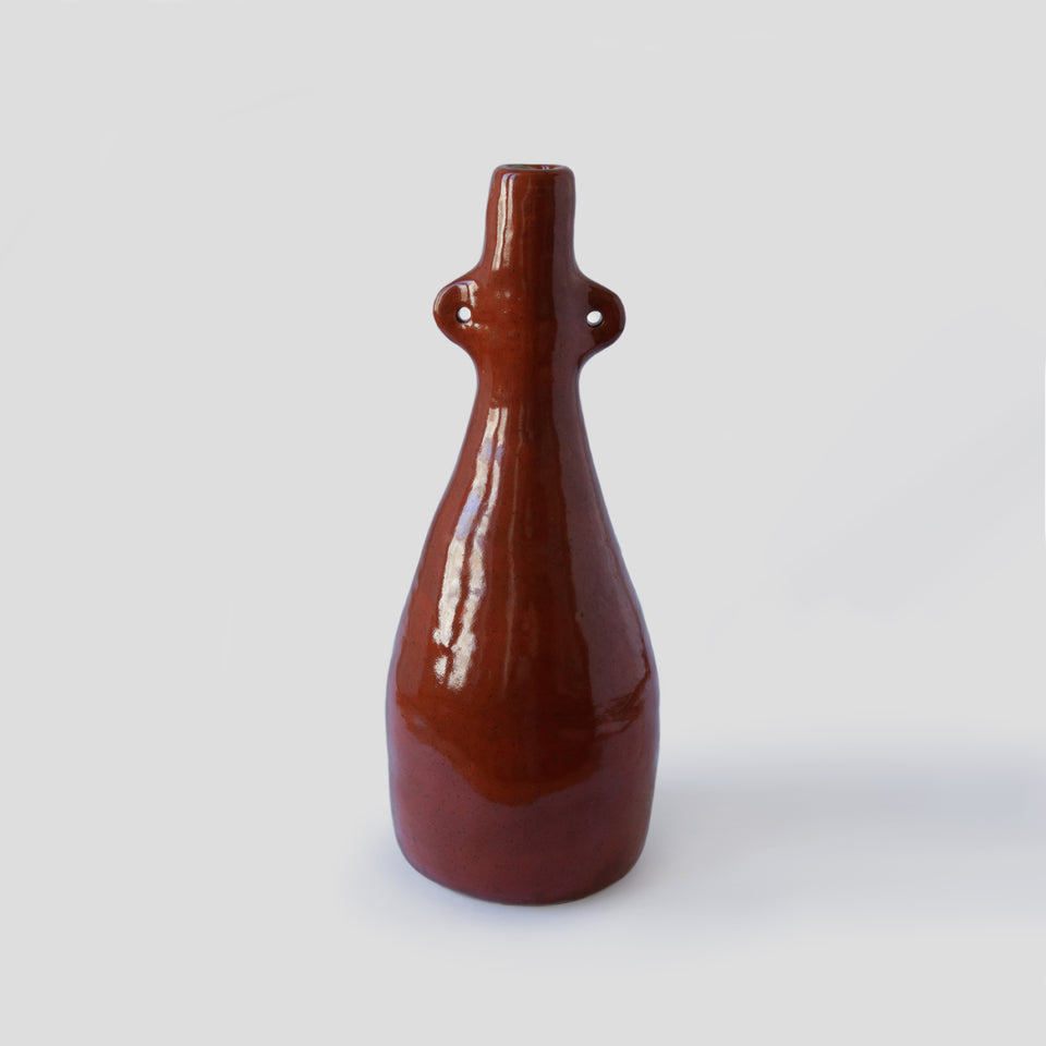Vase bouteille orange brûlé