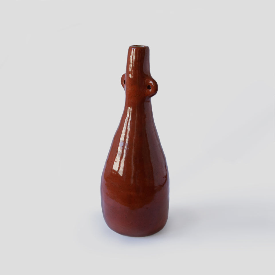 Vase bouteille orange brûlé