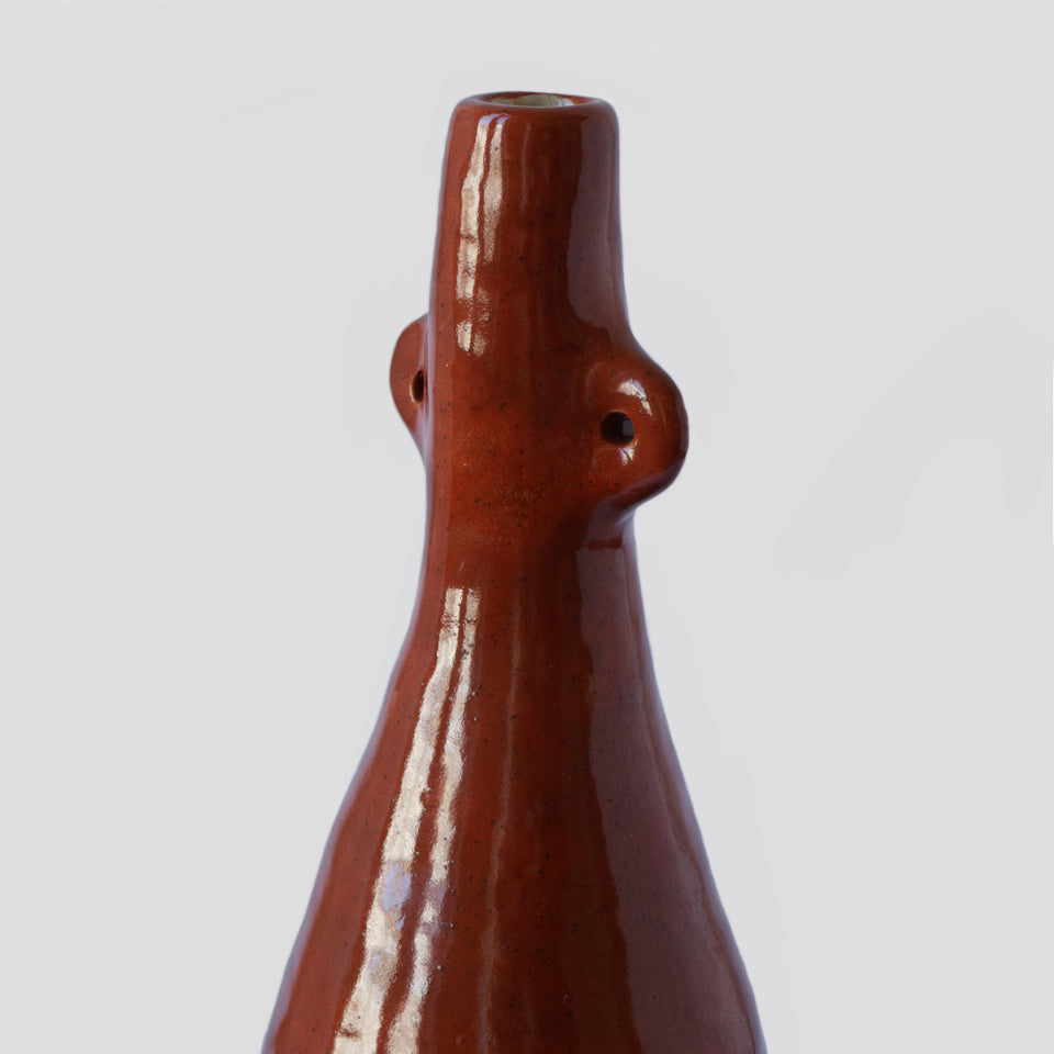 Vase bouteille orange brûlé