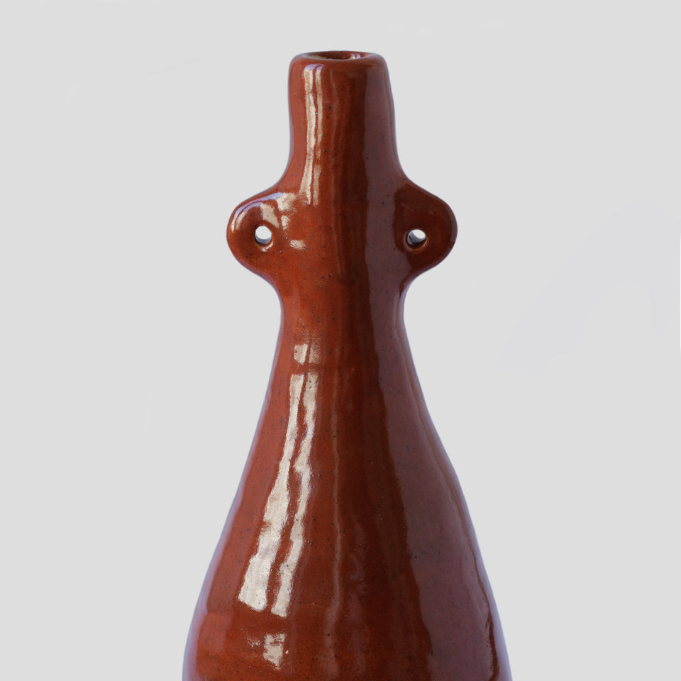 Vase bouteille orange brûlé