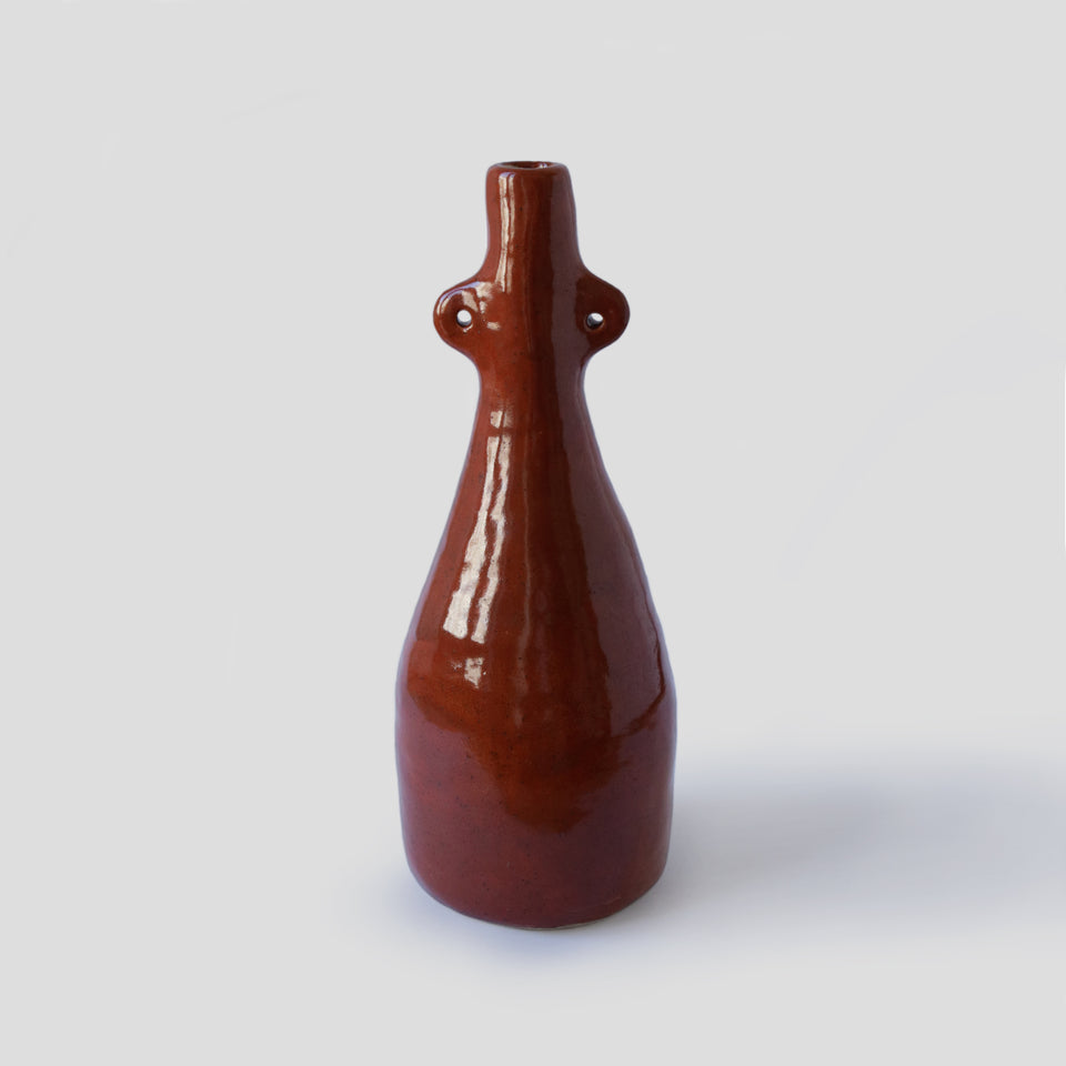 Vase bouteille orange brûlé