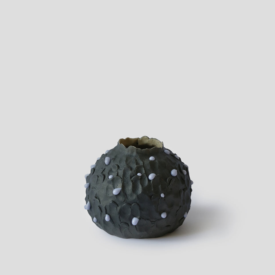 Black Pot pourri with mauve drops