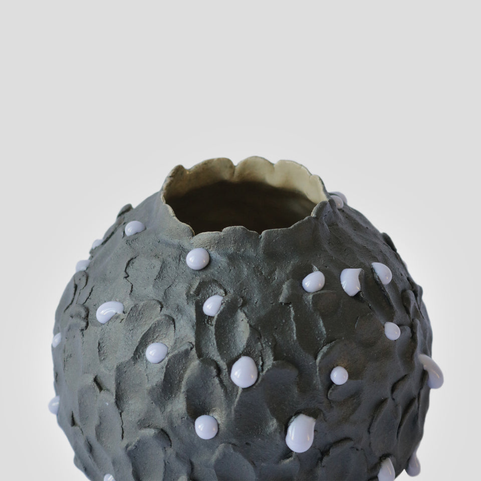 Black Pot pourri with mauve drops