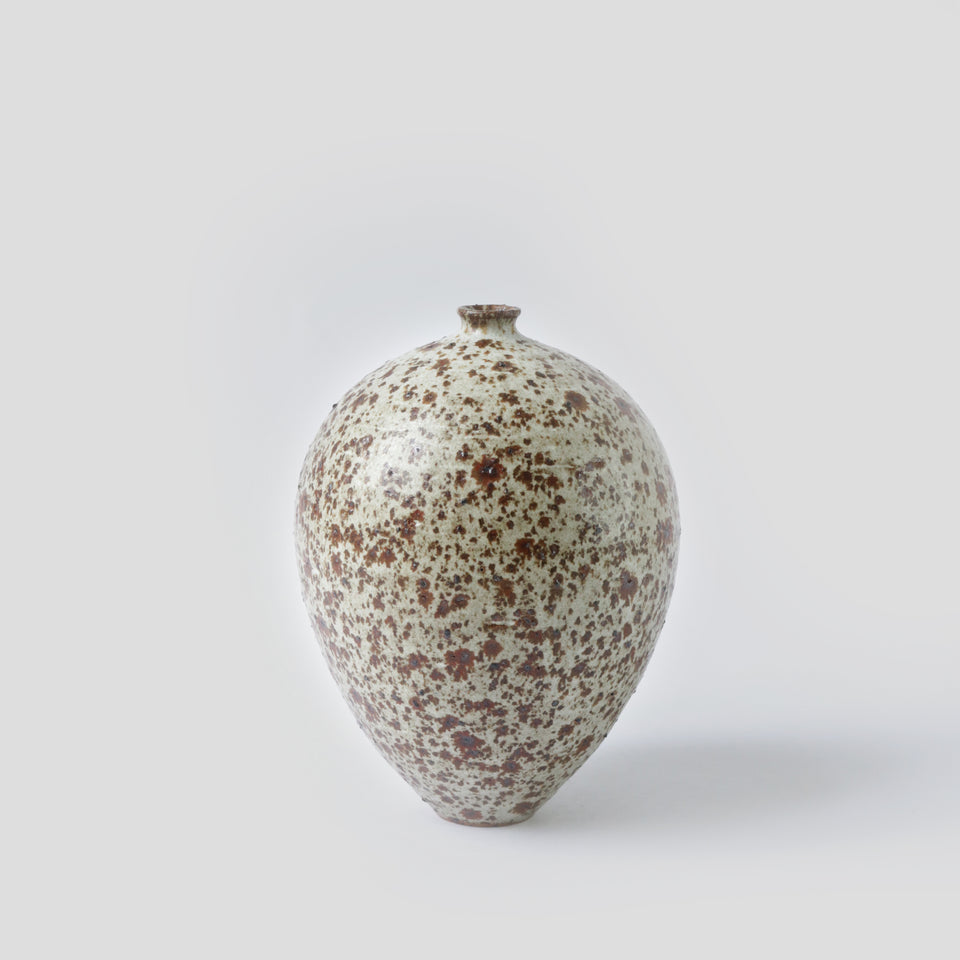 Bud vase with volcanic rocks 1