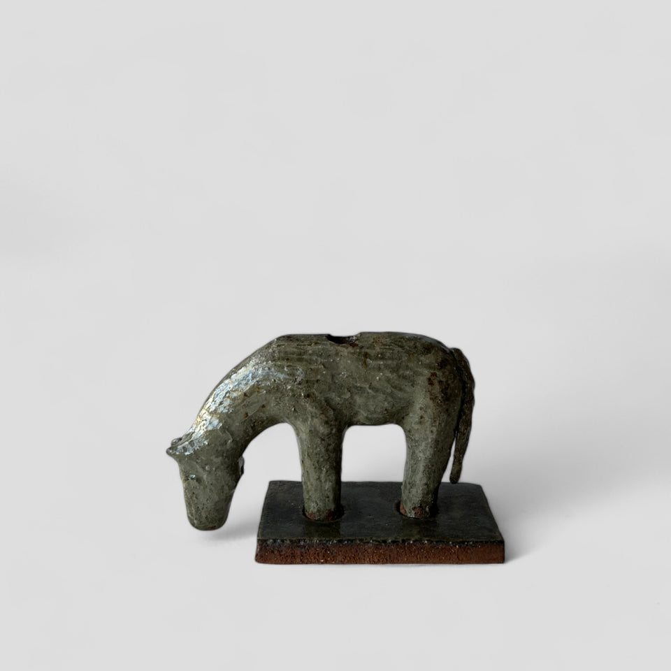 A shiny horse (candleholder)