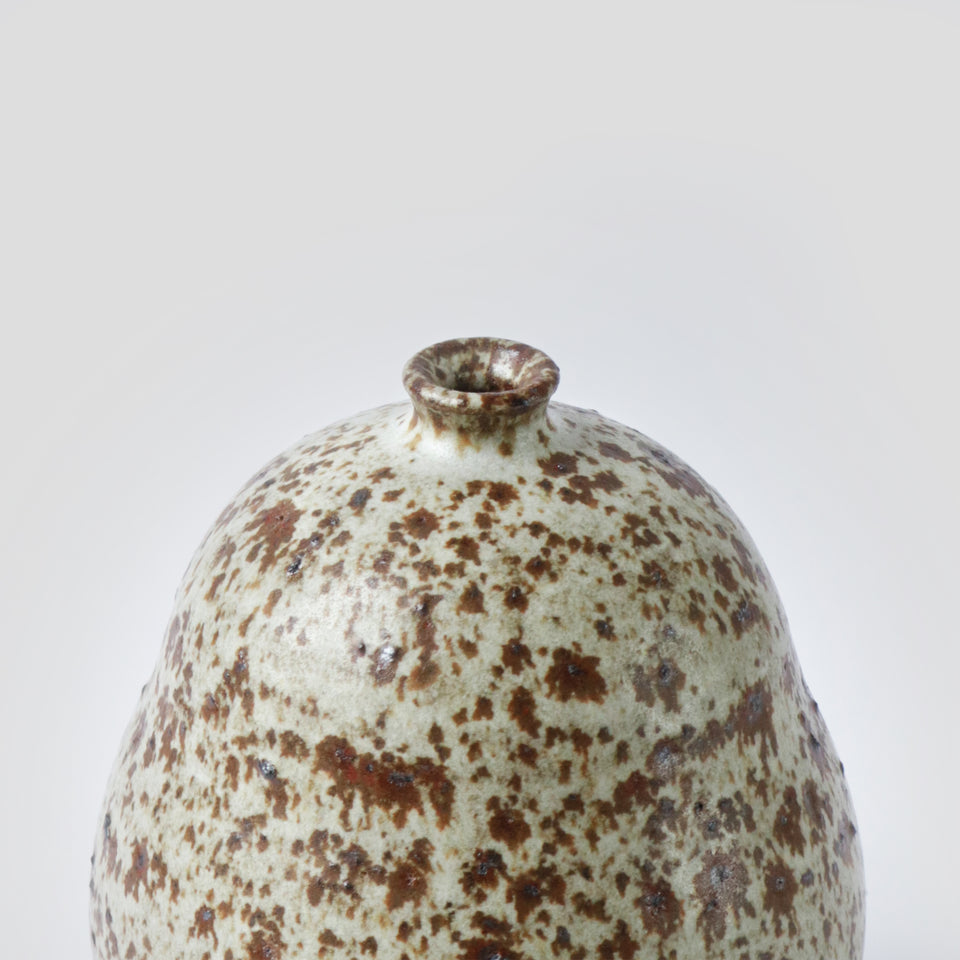 Bud vase with volcanic rocks 2